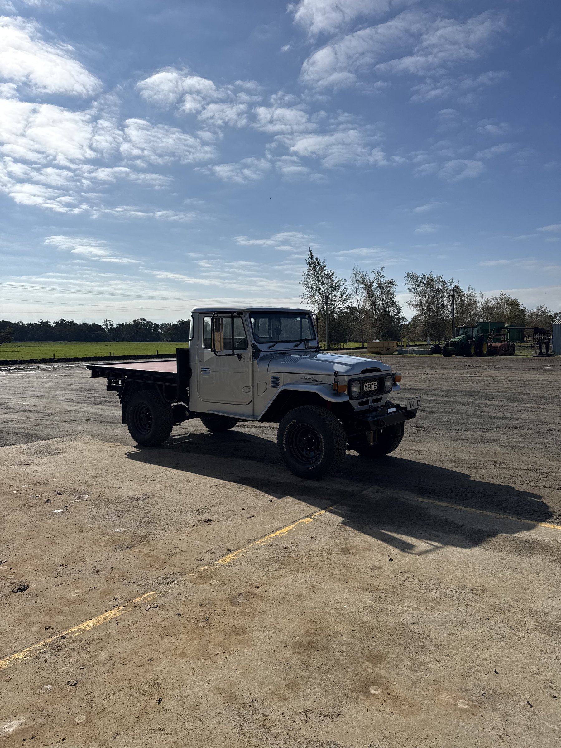 Front three-quarter of the finished HJ47 in the yard
