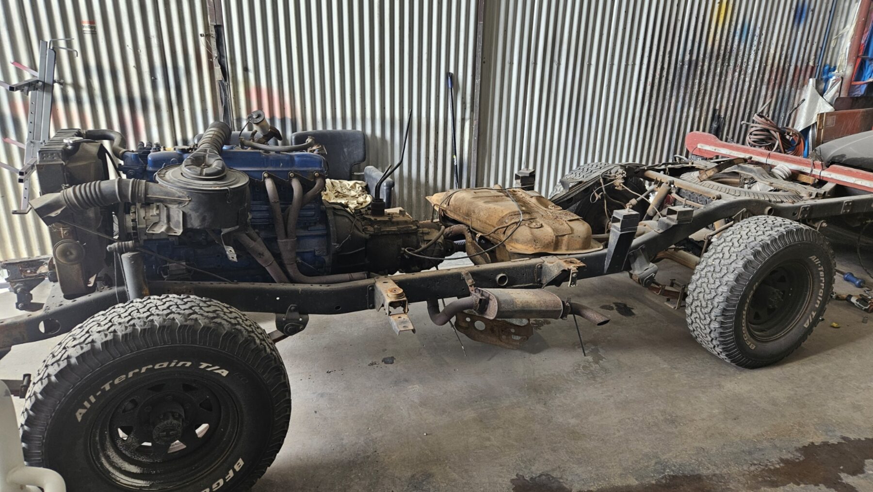 Bare chassis with drivetrain and blue engine